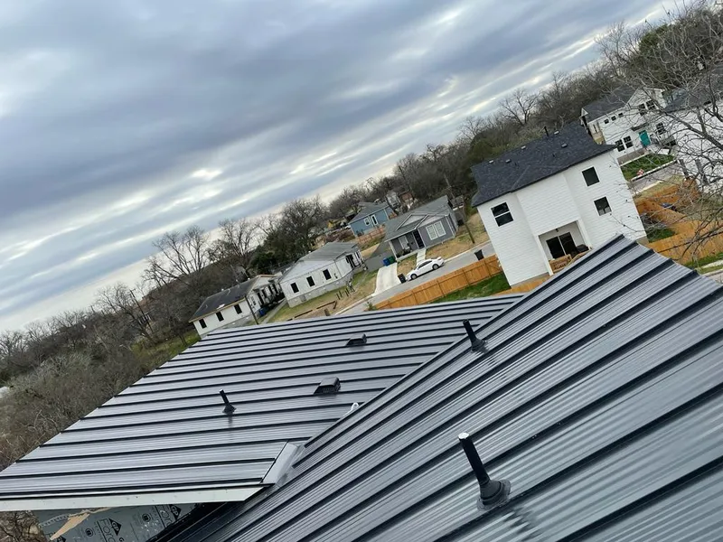 Standing seam metal roof panels with vents for Skylight Repair in St. Helens